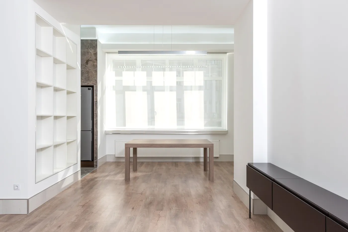 Bright white shelving in an airy room